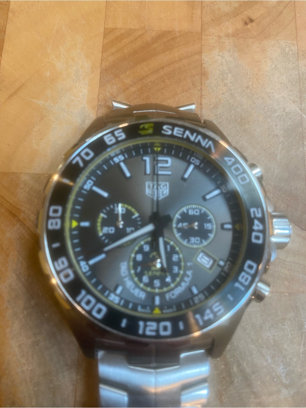 New  Tag Heuer Stainless Steel Chronograph with Black Dial and Yellow Highlights